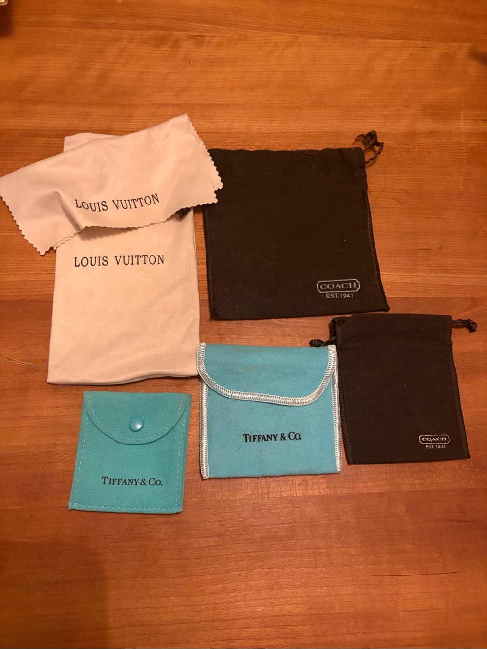 Tiffany & Co. and Coach Jewelry Pouches with Louis Vuitton Glasses Pouch/Cloth